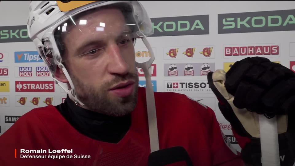 Groupe A, Suisse - Canada (2-3): les Suisses Roman Josi et Romain Loeffel à l'interview d'après-match