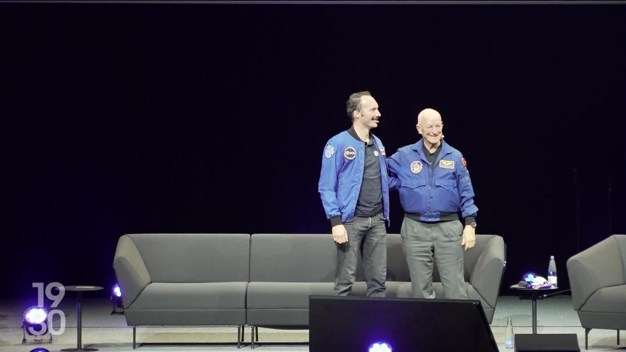 Jeudi, l’astronaute Claude Nicollier a passé symboliquement le témoin à son successeur Marco Sieber, devant le public de l'EPFL à Lausanne (VD)