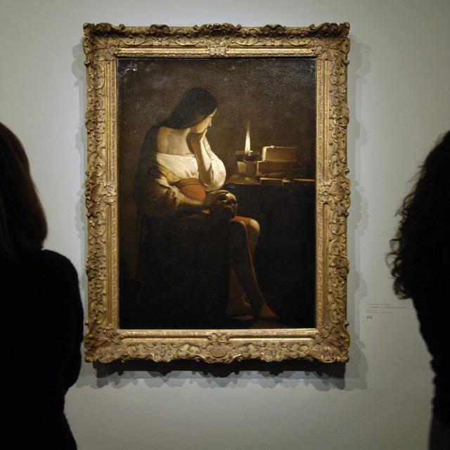 Le tableau "La Madeleine à la veilleuse" de George De La Tour au Grand-Palais de Paris lors d'une exposition en 2005. [AFP - Eric Feferberg]