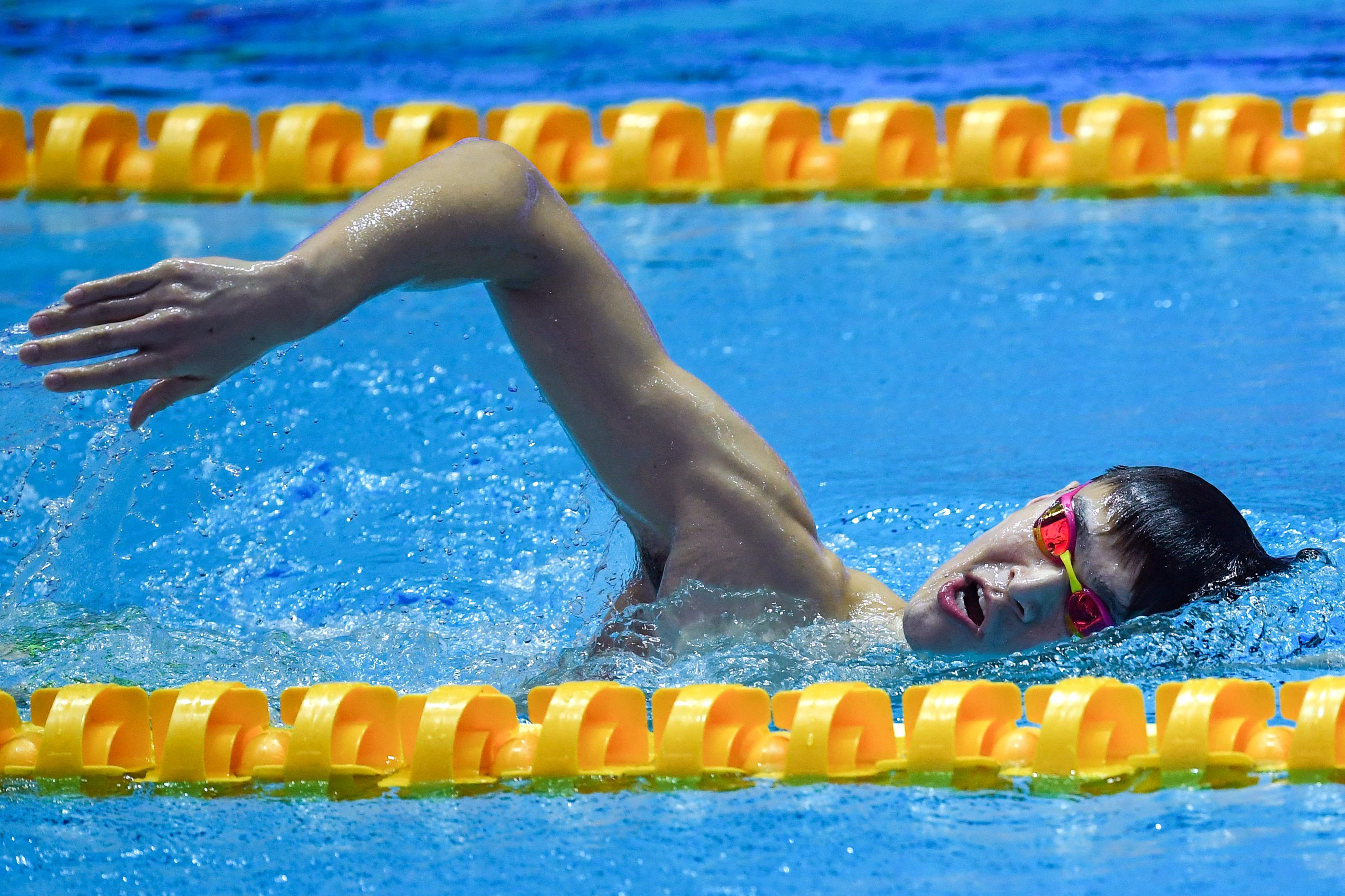 Sun Yang compte à son palmarès 3 médailles d'or olympiques, à Londres en 2012 (400 m et 1500 m nage libre), puis Rio en 2016 (200 m). Il compte 11 titres de champion du monde. [AFP - Manan VATSYAYANA]